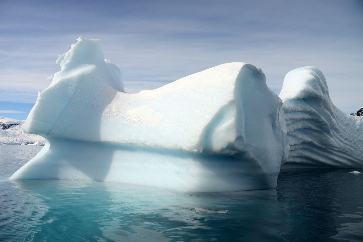 15A Two Contoured Icebergs Next To Cuverville Island From Zodiac On Quark Expeditions Antarctica Cruise